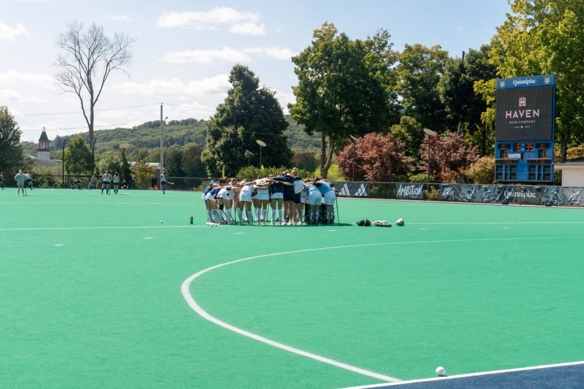 Quinnipiac huddles up before taking on Stonehill on Sept. 8, 2024.