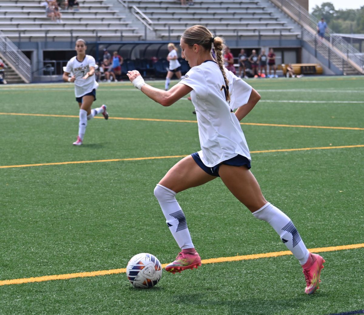 Sophomore forward Addyson  Earl dribbles down field against Rider on Sept. 6. 