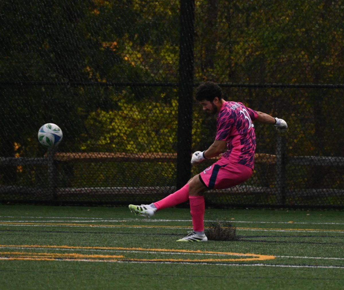 Senior goaltender Nickolas Cardona punts ball during matchup against New Haven, after not playing for the Bobcats since November 2023 due to injury. 