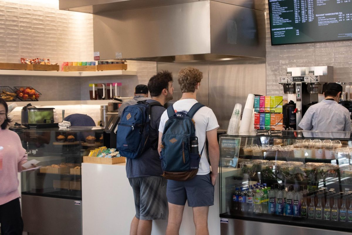 Students visit the new School of Business Café before or after class with its convenient location.
