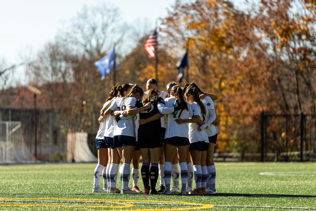 Quinnipiac in a team huddle against Iona on Nov. 3.