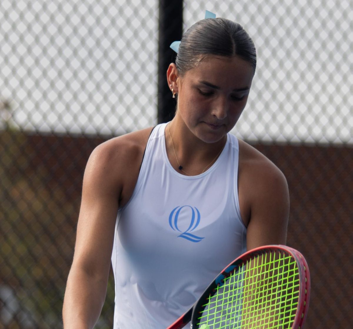 Sophomore Willow Renton gets ready to serve against UConn on Sept. 6. 