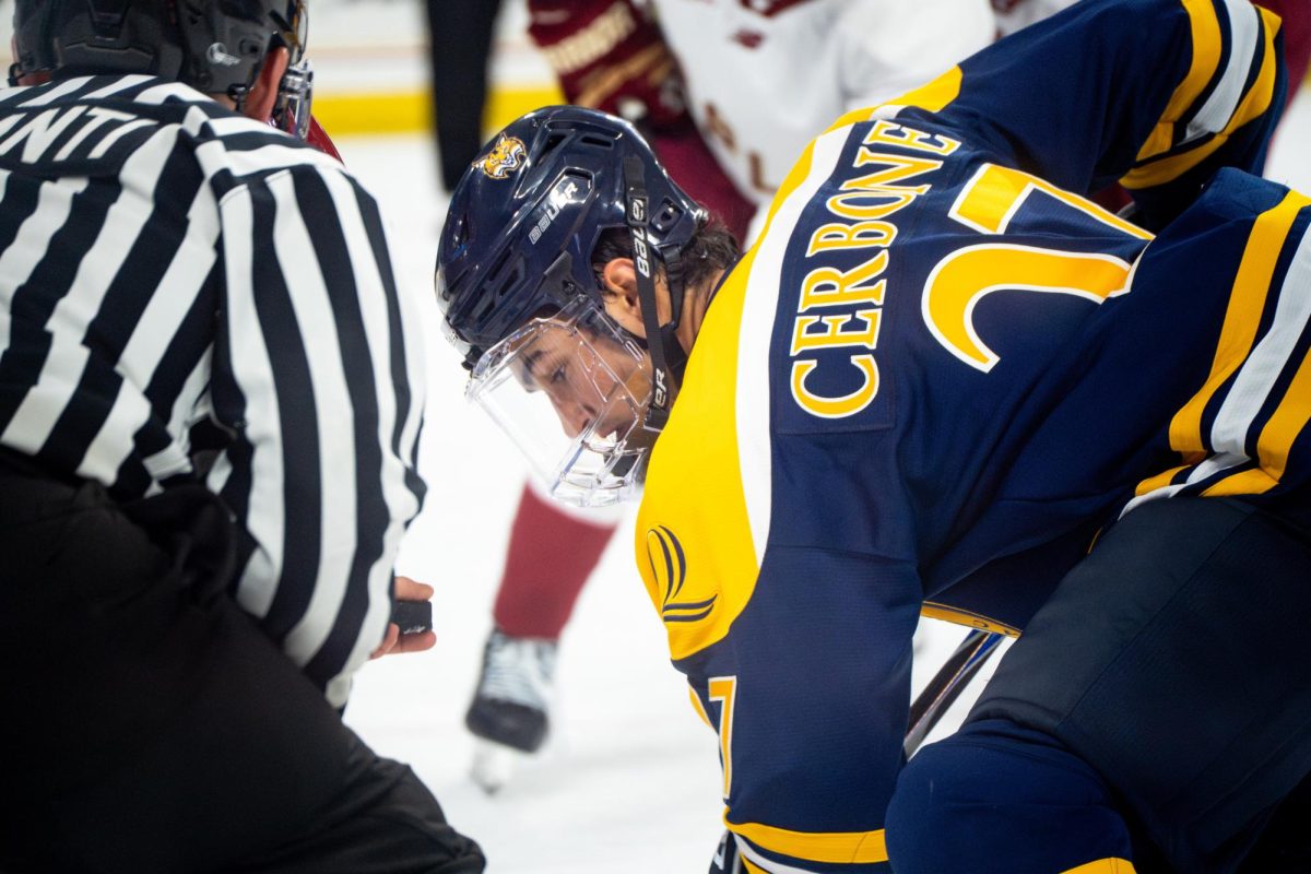 Junior forward Andon Cerbone lines up for a faceoff against Boston College on Oct. 3. 