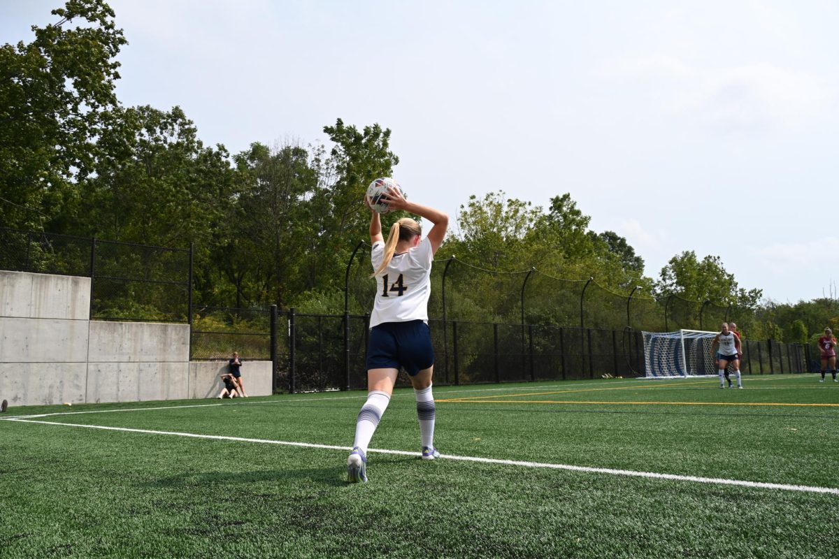 Freshman defenseman Märta Ankarcrona throws the ball in bounds against Rider on Sept. 6.