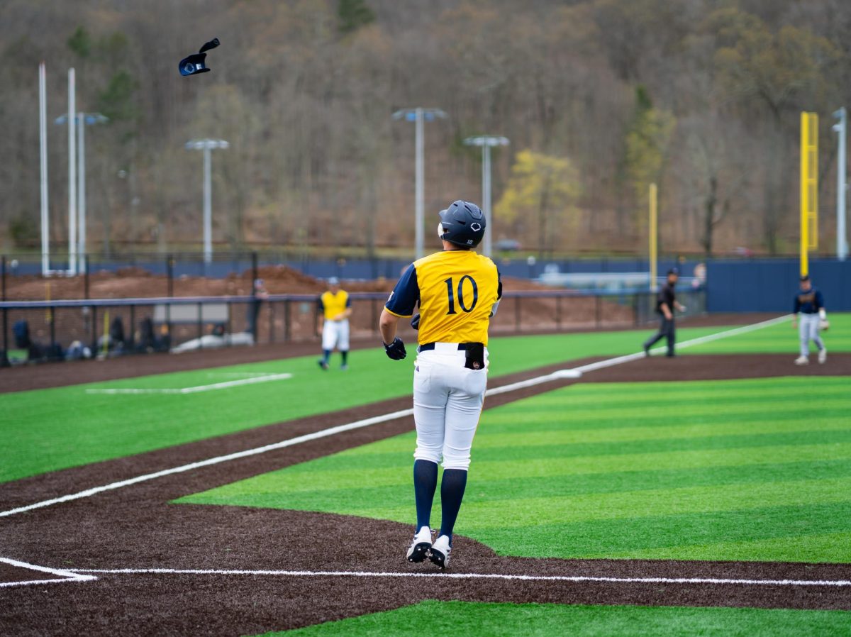 CJ Willis '25 drawing the walk against Canisius on April 4, 2024.