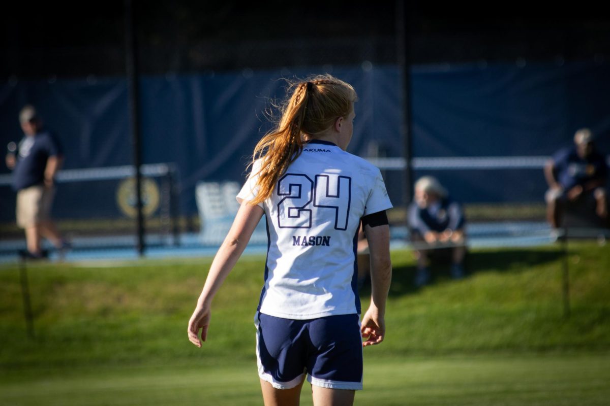 Senior fullback Gillian Mason walks down field against Lidenwood on Sept. 19.