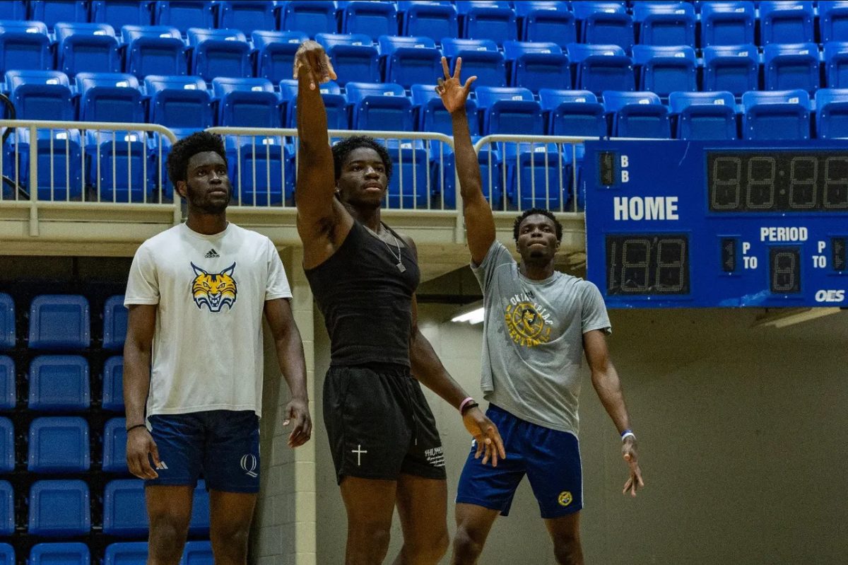 Sophomore forward Spence Wewe and junior forward Akintola Akinniyi with freshman forward Sam Nosakare during practice.

Courtesy of Spence Wewe