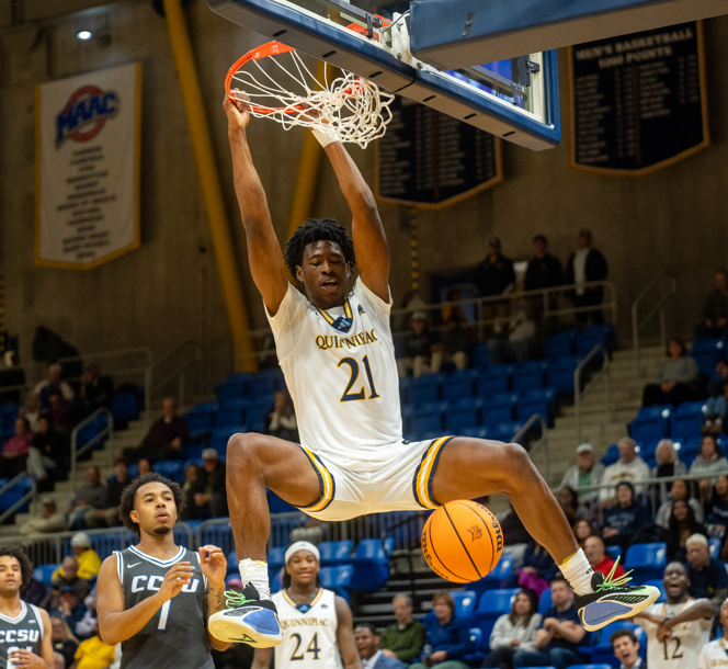 Freshman guard Keith McKNight dunking against CCSU on Nov. 6