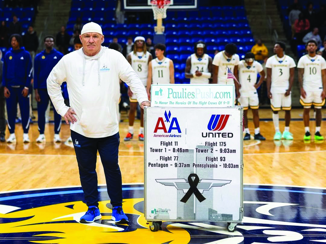 Paul “Paulie” Veneto is honored center court during Quinnipiac’s Salute to Service event on Nov. 11 at the men’s basketball game against Yale. (Photo Courtesy of Quinnipiac Athletics)